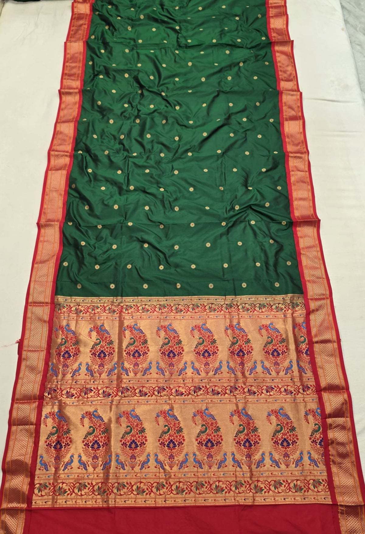 Bottle Green 9 yard silk Paithani Nauvari saree with red border, shoulder butta and peacock pallu