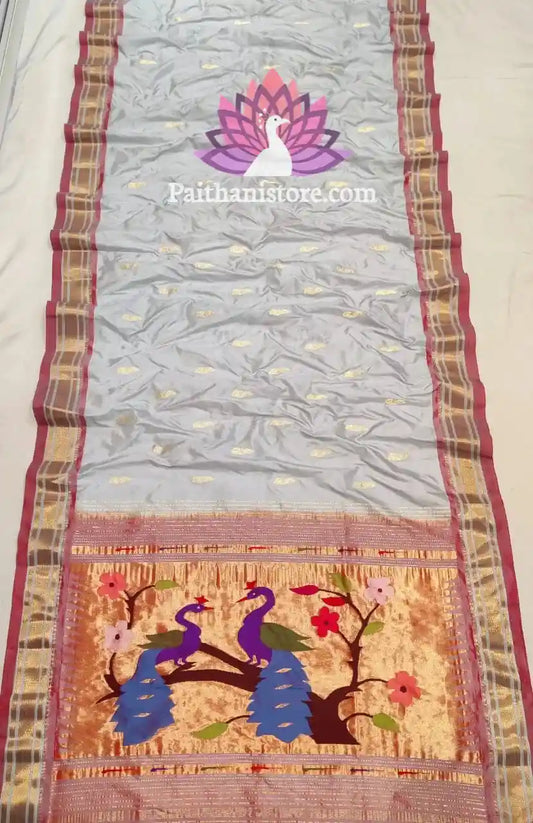 Regal Aura: Paithani Saree with Exquisite Zari Border