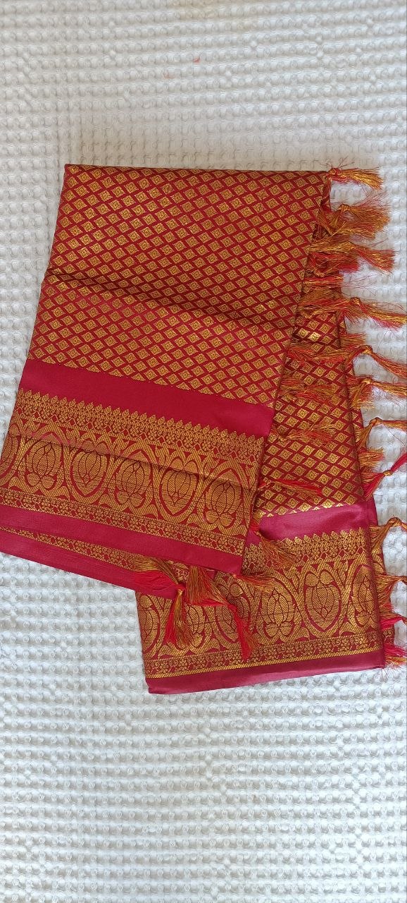 Maroon Paithani Shela with pink-gold lotus-motif pallu border