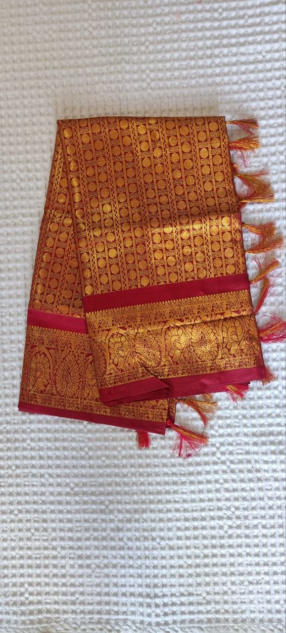 Orange Paithani Shela with gold circle-in-square weave